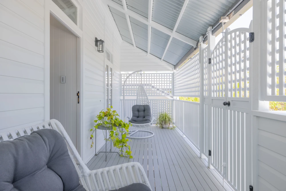 View of freshly renovated enclosed verandah in East Brisbane Queenslander designed by Three Stems